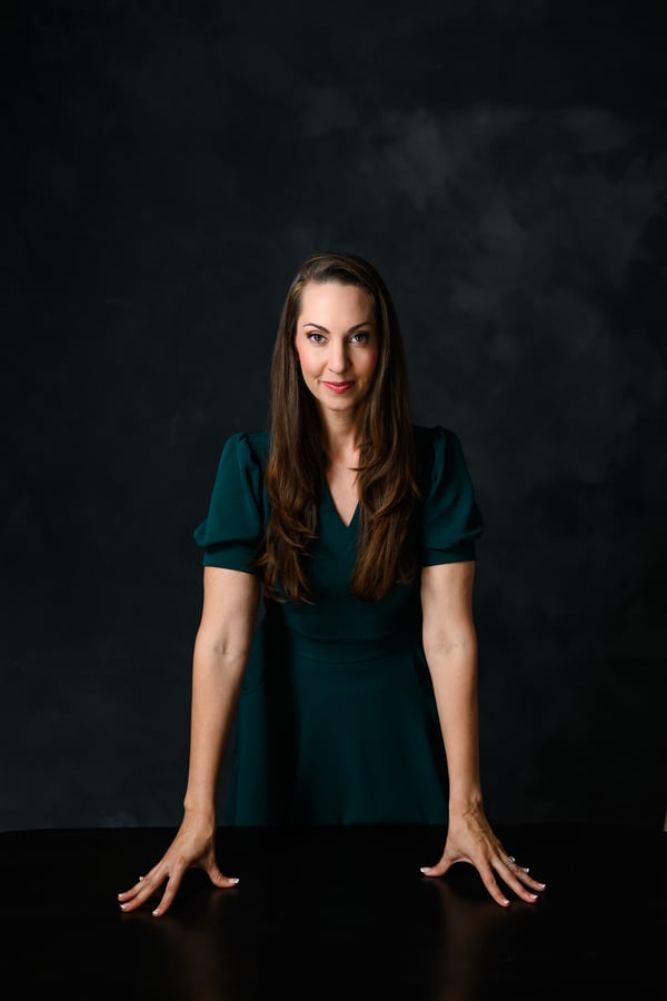 Vanessa Van Edwards poised studio portrait