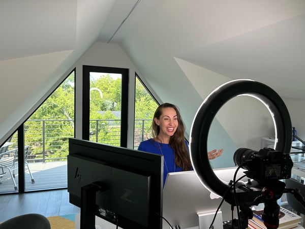 Vanessa Van Edwards recording video content in home studio