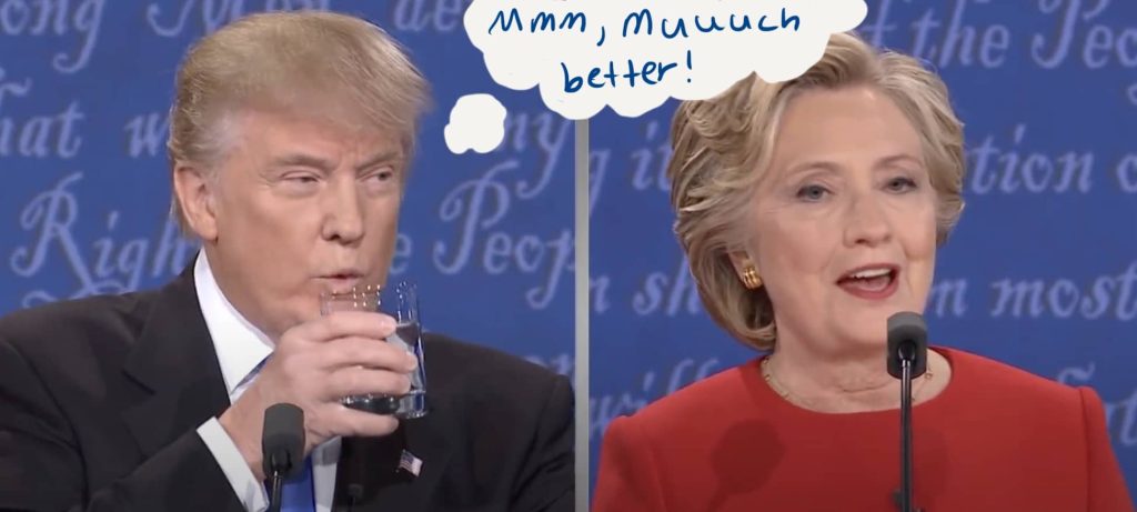 Trump drinks a glass of water while Clinton speaks.