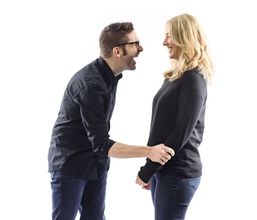 Warm touch, which is one of many open body language examples
