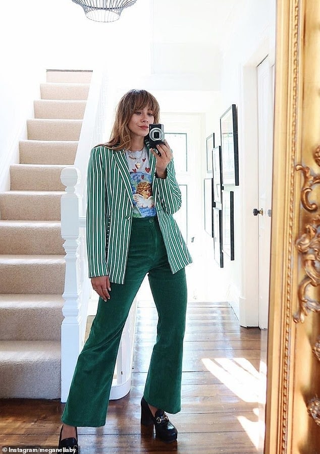Manchester style blogger Megan Ellaby showing off her all-green outfit in this new Jazz pose