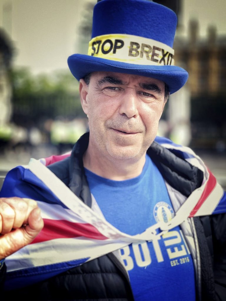 Steve Bray wearing a UK flag and a hat with Stop Brexit on it