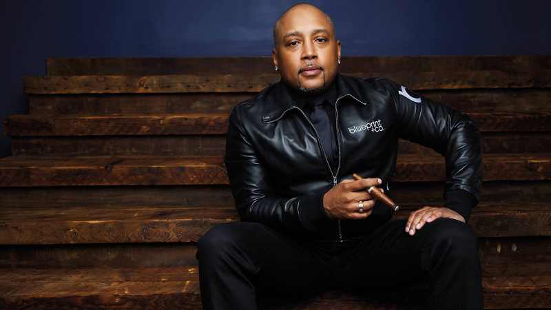 Daymond John in theseated-readiness position