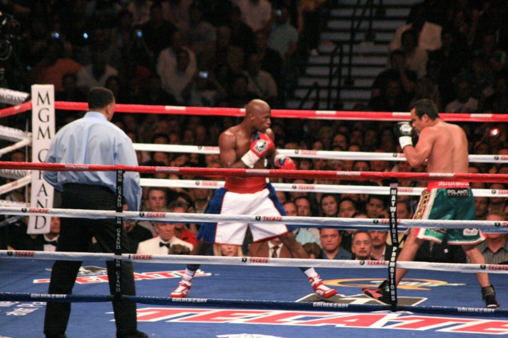 Floyd Mayweather, Jr. and Juan Manuel Márquez blading in the ring