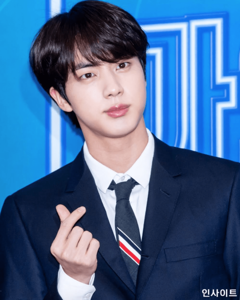 Jin from Korean pop group’s BTS with his upturned-lips. Source