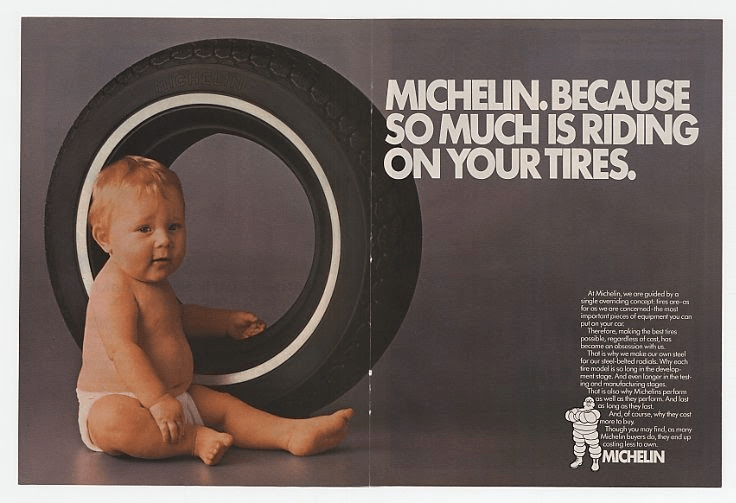 Old michelin ad showing a baby next to a tire