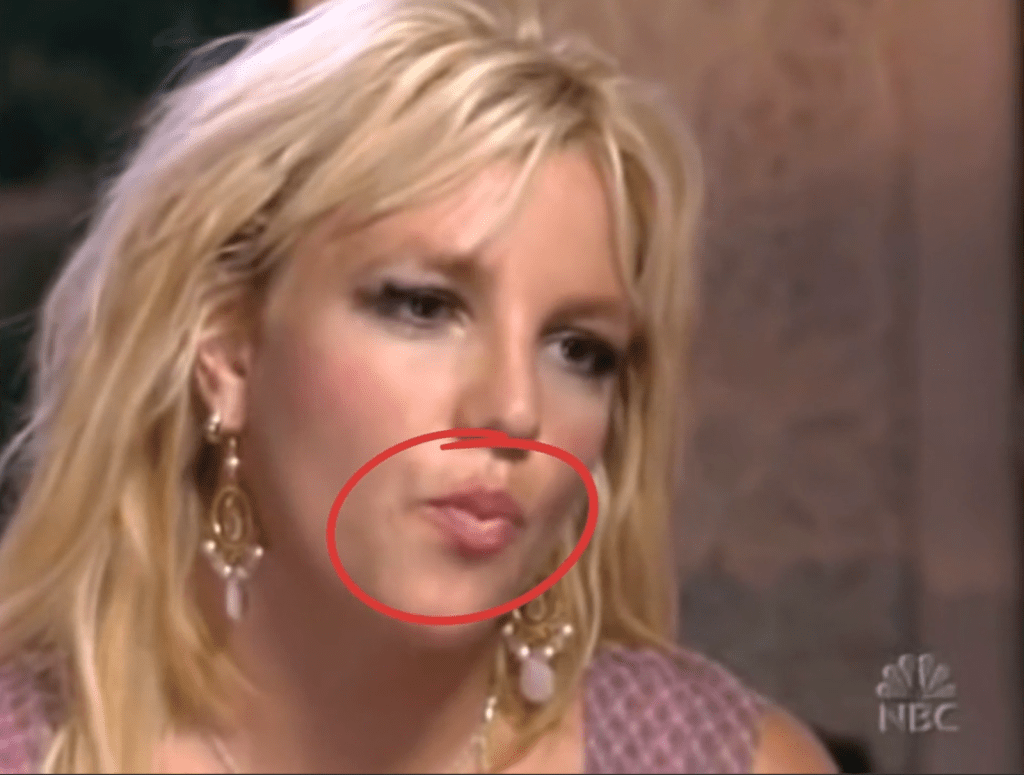 Britney Spears demonstrating a self-soothing mouth cue