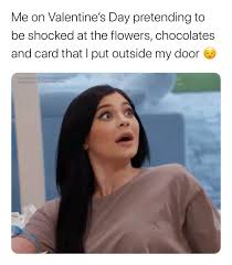 Me on Valentine's Day pretending to be shocked at the flowers. chocolates, and card that I put outside my door