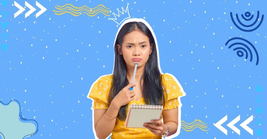 woman holding a pen thinking