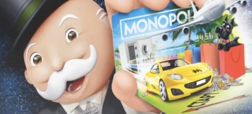 An image of the monopoly man holding up a monopoly card. Most people remember him having a monocle but he doesn't, which is an example of the mandela effect.