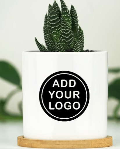Plant pot from Etsy with a company logo that would make a unique employee gift.