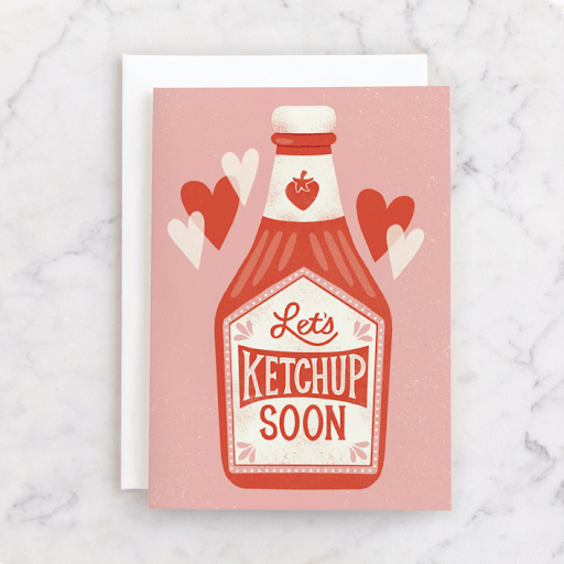 Punny gift basket with a ketchup card that says “Let’s ketchup soon!” as a going away gift