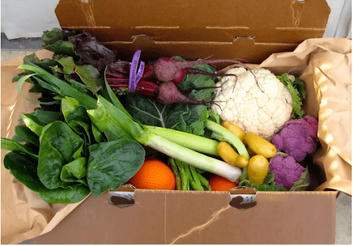 Produce box vegetables from Home Grown & Delivered that would make a unique employee gift.