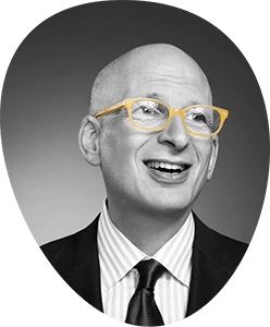 A headshot image of Seth Godin, and how he represents his brand in this photo. Also an example of how to dress for a zoom interview.