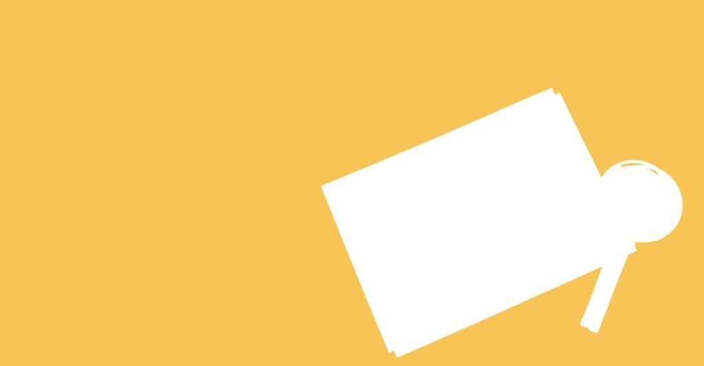 A graphic image of a white piece of paper and a white magnify glass on a yellow background which relates to the research article on how men are more attractive when they are articulate.