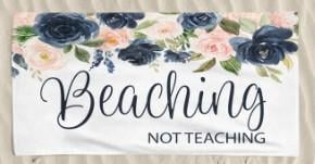 An image of one of many retirement gift ideas, a Teacher’s beach towel from Etsy