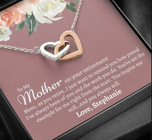 An image of one of many retirement gift ideas, a Retirement necklace for mom with two intertwined hearts