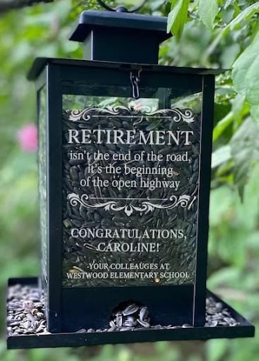 An image of one of many retirement gift ideas, a personalized Bird feeder