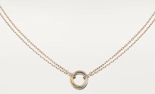 An image of one of many retirement gift ideas, a Cartier Trinity necklace