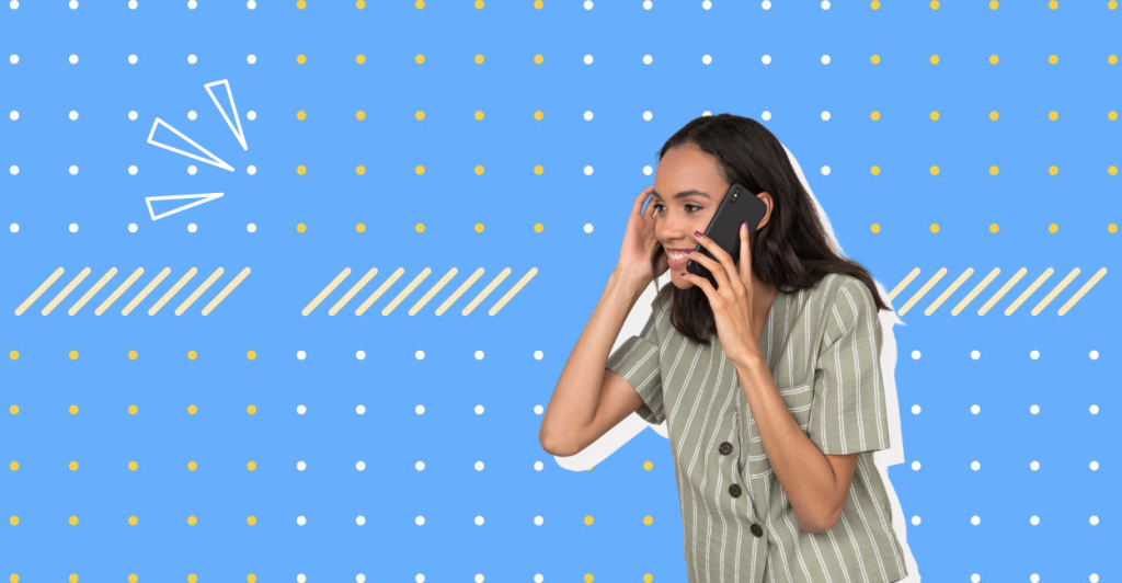 An image of a woman on the phone smiling
