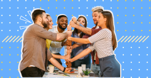 A diverse group of people are smiling and enthusiastically stacking their hands together in a show of teamwork and unity.